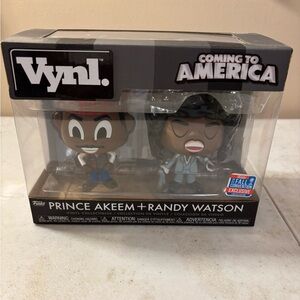 Coming to America featuring Prince Akeem + Randy Watson Funko Vinyl Figures.